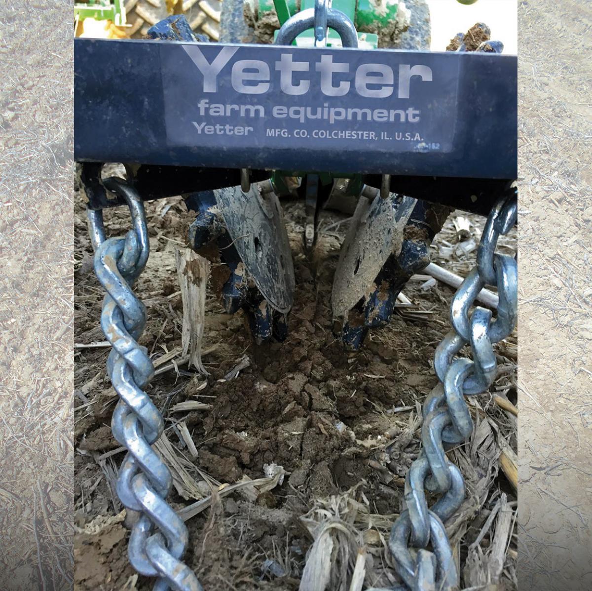 Closeup of 6200 Twister Poly Closing Wheels with drag chain closing seed furrow