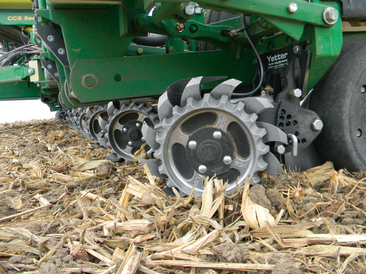 Side view of the 2967-029 Short Floating Row Cleaner in the field