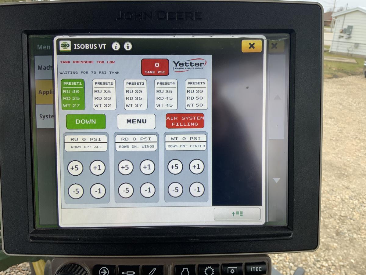 John Deere ISOBUS screen in tractor cab for controlling Yetter Air Adjust row units