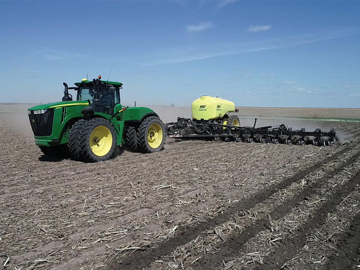 2984 Strip Freshener CCs on Fast DuraPlacer toolbar being pulled by John Deere tractor in the field